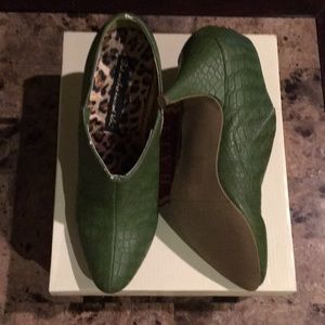 B.A.I.T. Faux leather, green booties.